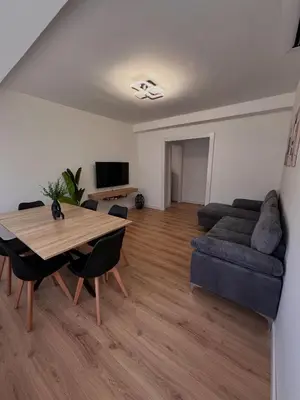 a living room with a table and a couch at El Surtidor in Anna