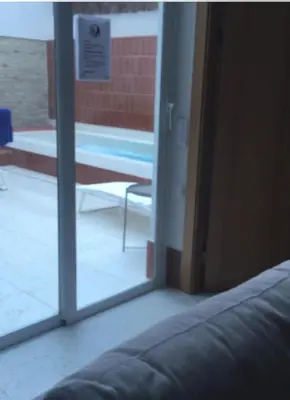 a sliding glass door with a view of a patio at Apartamento Cerca las Playa in Valencia