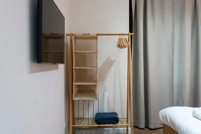 a bedroom with two beds with towels on them at Quart Historic Stay 1 in Valencia
