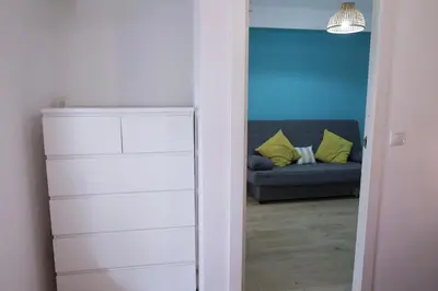a view of a living room with a couch at Cozy Seaside Apartment in Cullera in Cullera