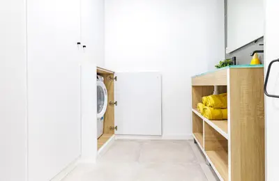 a room with white walls and a closet with yellow objects at Urban apartment BAJO 6 - HOUSEVANLIVE in Valencia