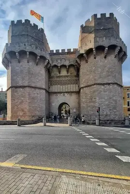 a large castle building with a street in front of it at Loft con jacuzzi y piscina in Valencia