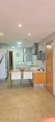 a kitchen with a large white counter in a room at Apartment Nules in Nules