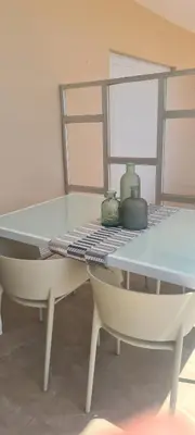 a white table with a lamp on top of it at Apartment Nules in Nules