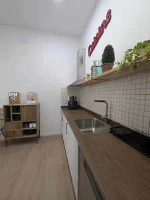 a kitchen with a sink and a counter top at Bonito loft para 4 personas in Valencia