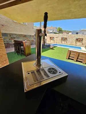 a blender sitting on top of a table at Amazing Villa with swimming pool in Torrent