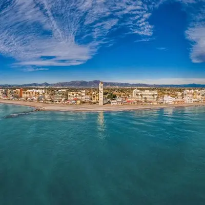 a view of a beach with buildings and the water at Nules Beach Apartment in Moncófar