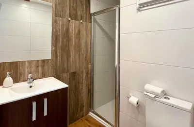 a bathroom with a sink and a shower at Bright, charming,in the historic center in Valencia