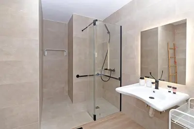 a bathroom with a shower and a sink at GuestReady - Lovely stay in the Algirós area in Valencia