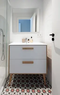 a bathroom with a white sink and a mirror at La Casa del Mar-Cabañal 3BR Suites in Valencia