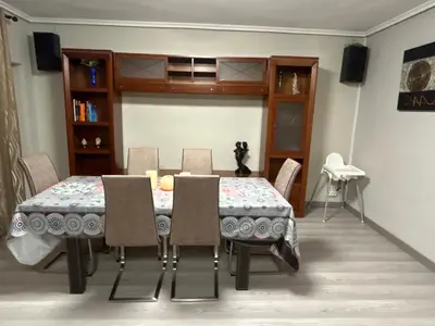 a dining room with a table and chairs at Chalet encanto in Chiva