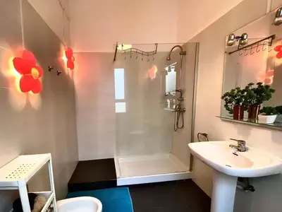 a bathroom with a shower and a sink and a toilet at Welcome to your Home in Valencia