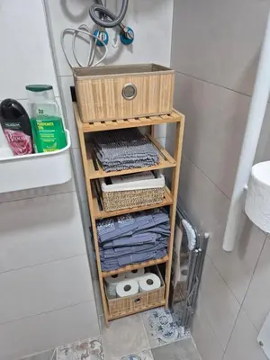 a wooden shelf in a bathroom with tools on it at Beach and City Valencia in Valencia