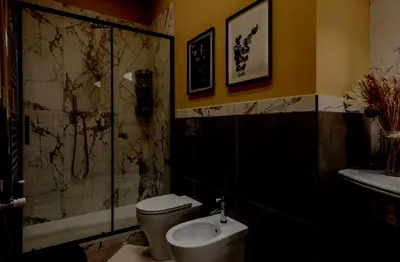 a bathroom with a toilet and a shower and a sink at Apartamento Aleyda in Valencia
