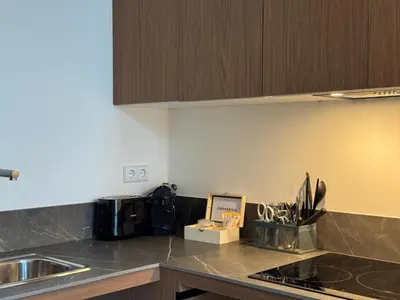 a kitchen with a sink and a counter top at Boutique Room - Plaza Tower in Valencia