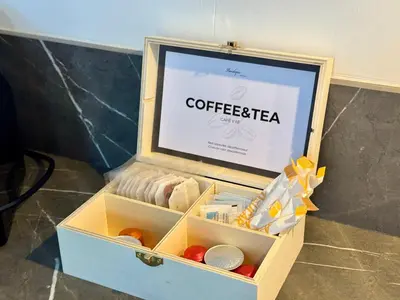 a wooden box with a sign in it with food at Boutique Room - Plaza Tower in Valencia
