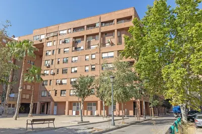a large brick building with a bench in front of it at GuestReady - Bright home in Valencia in Valencia