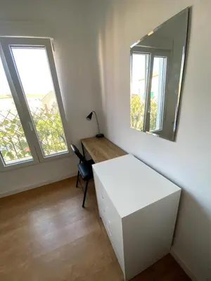 a room with a white desk and a mirror at Bright & Quiet Apartment Close to Central Valencia in Valencia