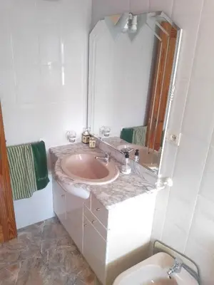 a bathroom with a sink and a toilet at Van-Dyck, ESC-4, 6-24 PK 18 in Cullera
