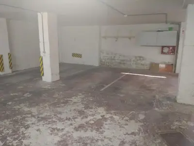 an empty parking lot in an empty garage at Van-Dyck, ESC-4, 6-24 PK 18 in Cullera