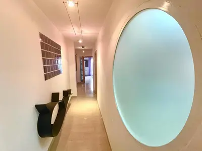 a hallway with a large mirror on the wall at luxury home vip valencia in Valencia