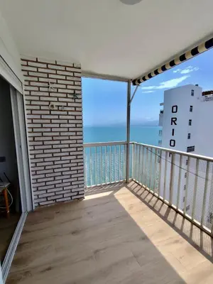 a balcony with a view of the ocean at Isla de los Pensamientos in Faro de Cullera
