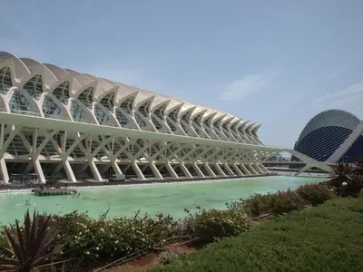 a large building with green water in front of it at L'Umbracle Views in Valencia