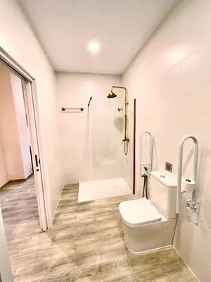 a white bathroom with a toilet and a shower at Urban Style in Valencia