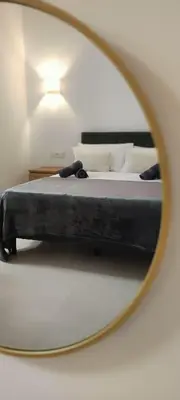 a bedroom with a bed in a mirror at Basset 1 in Valencia