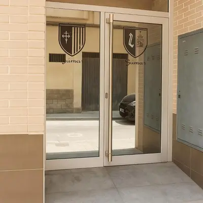 a metal elevator door with a switch on it at Acogedor y excelente ubicación in Puerto de Sagunto
