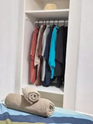 a closet filled with lots of clothes at All you need in Valencia