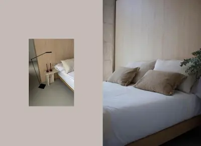 a bedroom with a bed with white sheets and pillows at BNO studio 1c in Aldaia