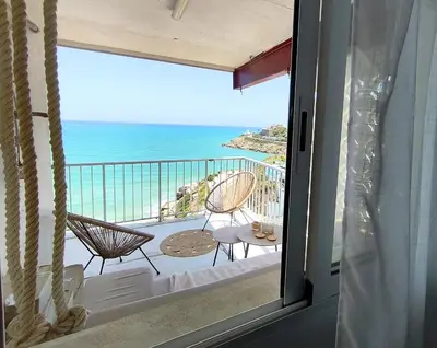 a balcony with a view of the ocean at Faro Cullera Sea view in Faro de Cullera