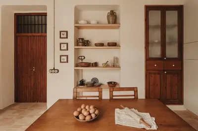 a kitchen with a wooden table with eggs on it at Casa Salvoreta in Valencia