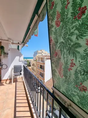 a balcony with a view of the ocean at District Key - Puerto de Sagunto, Virgen Losar in Puerto de Sagunto