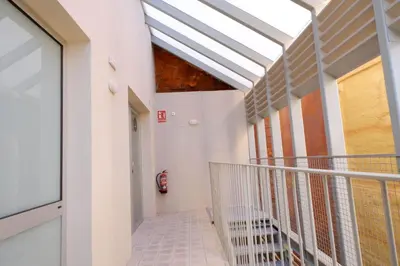 a hallway of a building with a skylight at Apartment San Pedro 4 in Valencia