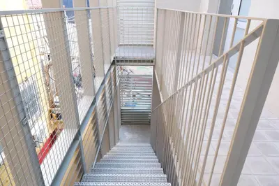 a stairway in a building with escalators at Apartment San Pedro 4 in Valencia