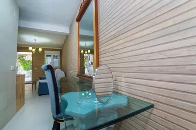 a glass table and a chair in a room at L'Otelet By Sweet in Valencia