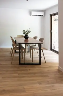 a dining room with a table and chairs at VLC Host - Belgica Apartments in Valencia