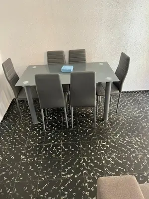 a table and chairs in a meeting room at Aldair in Valencia