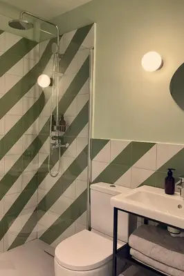 a bathroom with a shower and a toilet and a sink at Casa Juana in Valencia