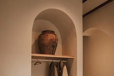 a vase sitting on a shelf in a room at Casa Lina in Valencia