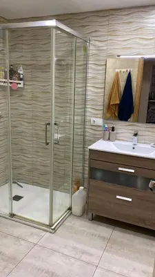 a bathroom with a shower and a sink at Apartamento en Cullera playa con amplio balcón in Cullera