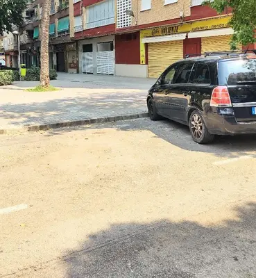 a black van parked in a parking lot at LUXURY APARTMENT SCIENCES CITY Valencia B in Valencia