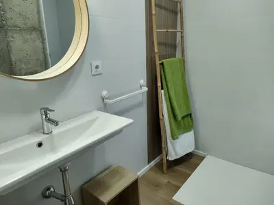 a bathroom with a sink and a mirror at LUXURY APARTMENT SCIENCES CITY Valencia B in Valencia
