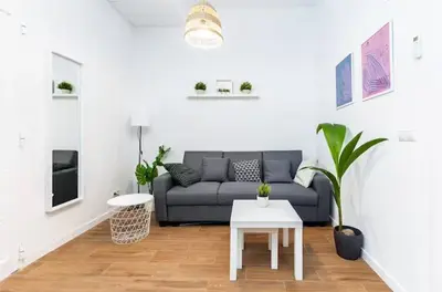 a living room with a couch and a table at Nuevo acogedor cerca del Centro in Valencia