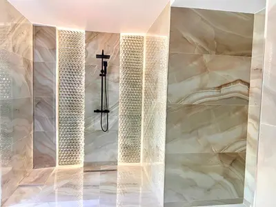 a chapel with a cross on the wall at Luxury villa with swimming pool in the forest in Gilet