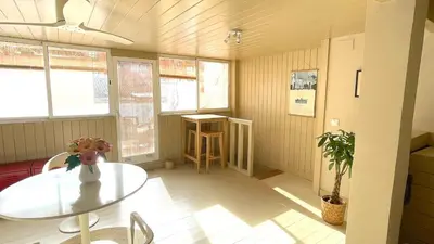 a room with a table and a potted plant at Apartamento Joaquín Sorolla - Patraix in Valencia