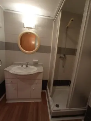 a bathroom with a sink and a shower at MiCampus Burjassot 1 Student Residence in Burjasot