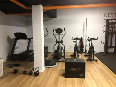 a gym with several exercise bikes in a room at MiCampus Burjassot 1 Student Residence in Burjasot